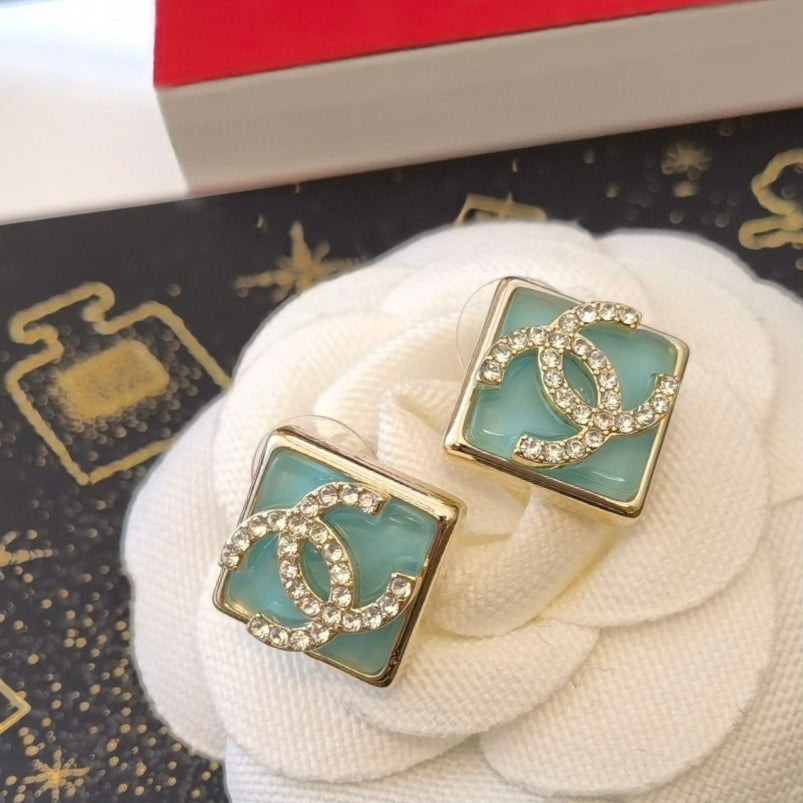 Chanel Blue Resin 18K Gold Earrings