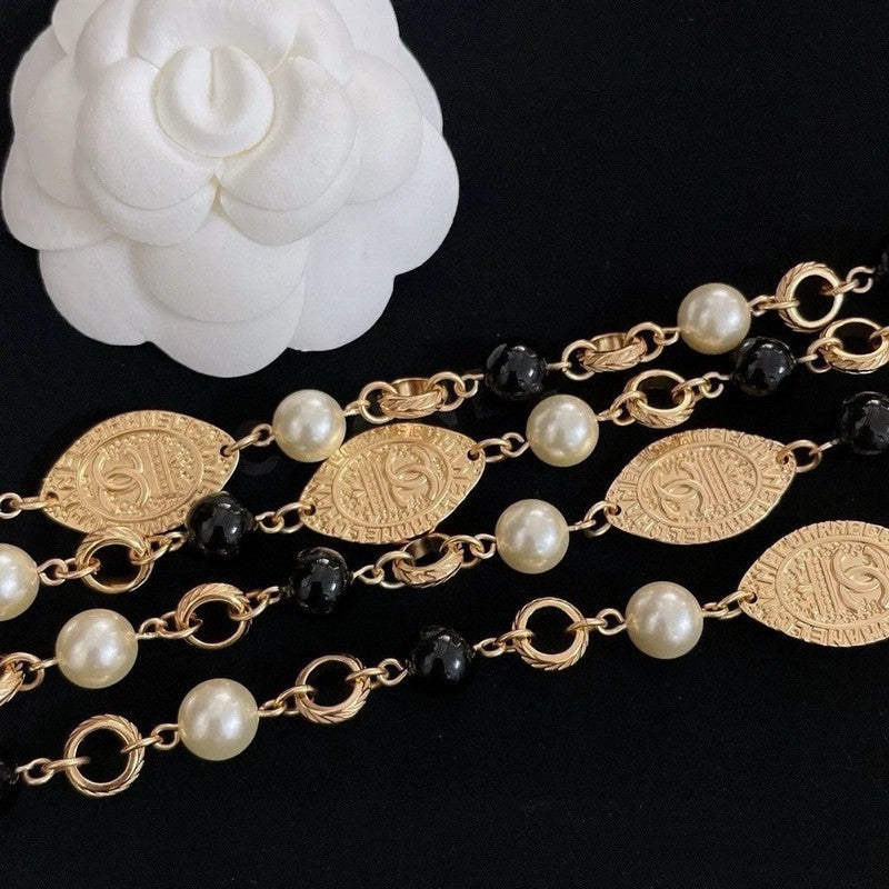 Chanel Long Black & White Pearls 18K Gold Necklace